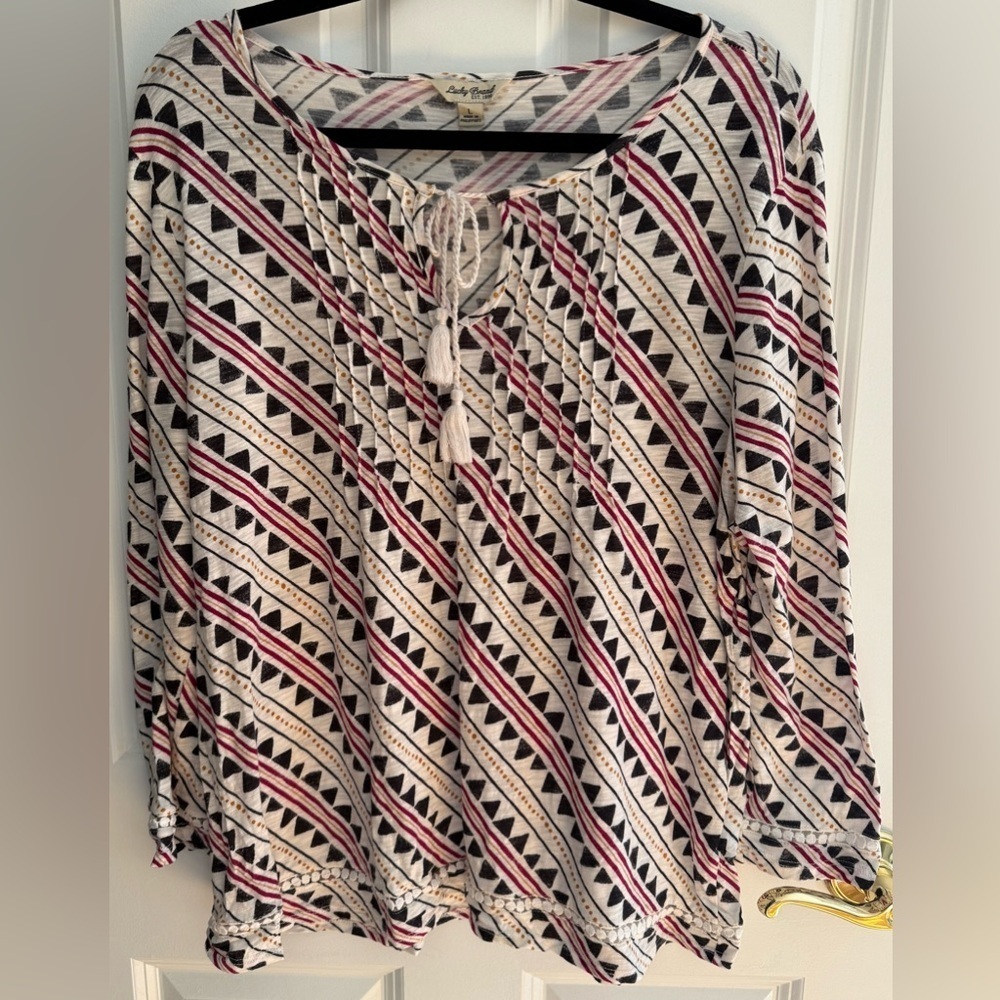 Lucky Brand Tribal Rhythm Top β Size L
Boho β’ Fall Ready β’ Excellent Condition - Picture 7 of 8